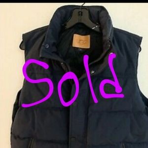 Sold/Navy blue Ugg  down vest/covered with wrap
